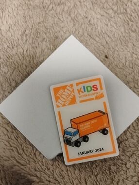 2024 HOME DEPOT KIDS WORKSHOPS JANUARY DELIVERY TRUCK COMMEMORATIVE PIN MINT
